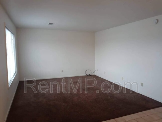 Building Photo - 722 W Broomfield St