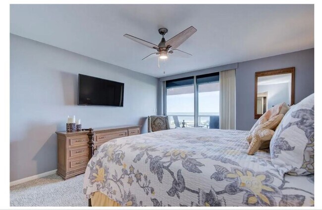 Building Photo - Newly Renovated Beachfront Condo with Stun...