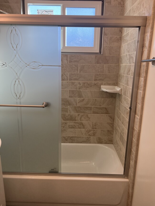 new tub with shower - 420 W Alameda Ave