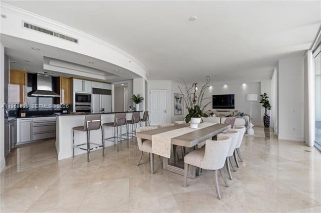 Building Photo - 10295 Collins Ave