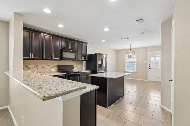 Building Photo - 9209 Bowfield Dr