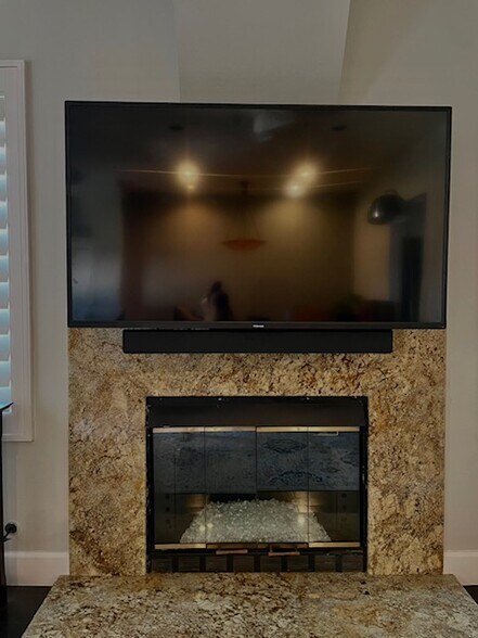 Full 55" wide screen above F/P - 97 Corsica Dr