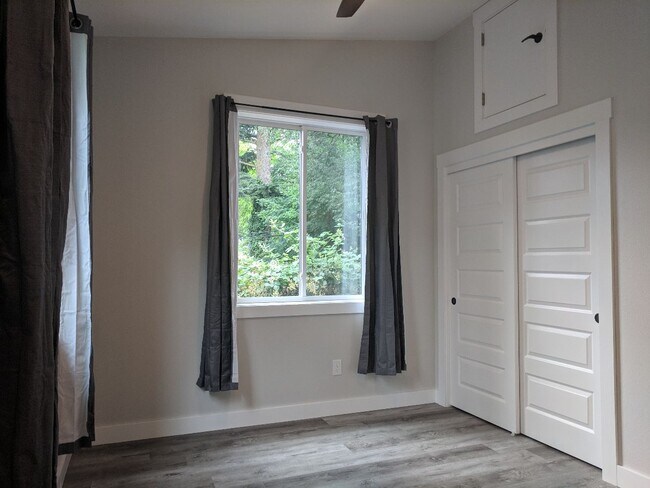 Bedroom with storage / folding ladder - 2930 SW Nevada Ct