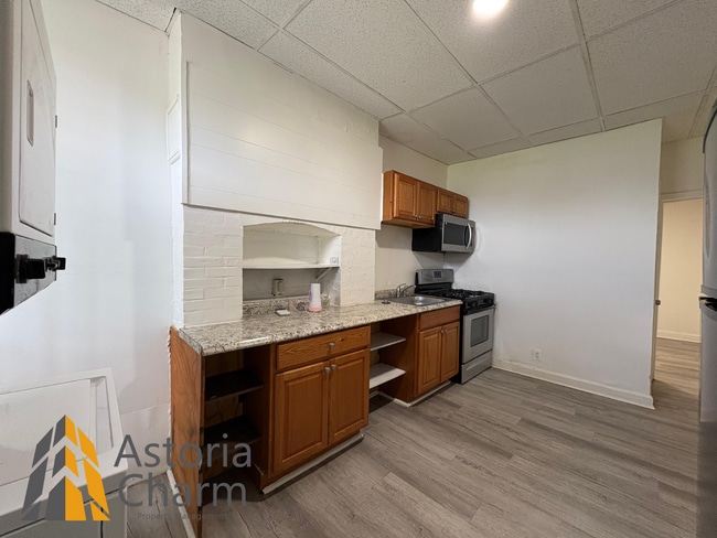 Building Photo - Updated 4 BR Home with Spacious Yard & Pre...