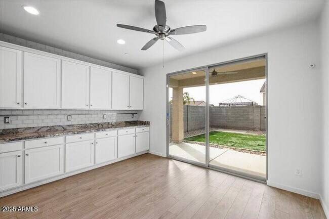 Building Photo - 21451 W Palm Ln