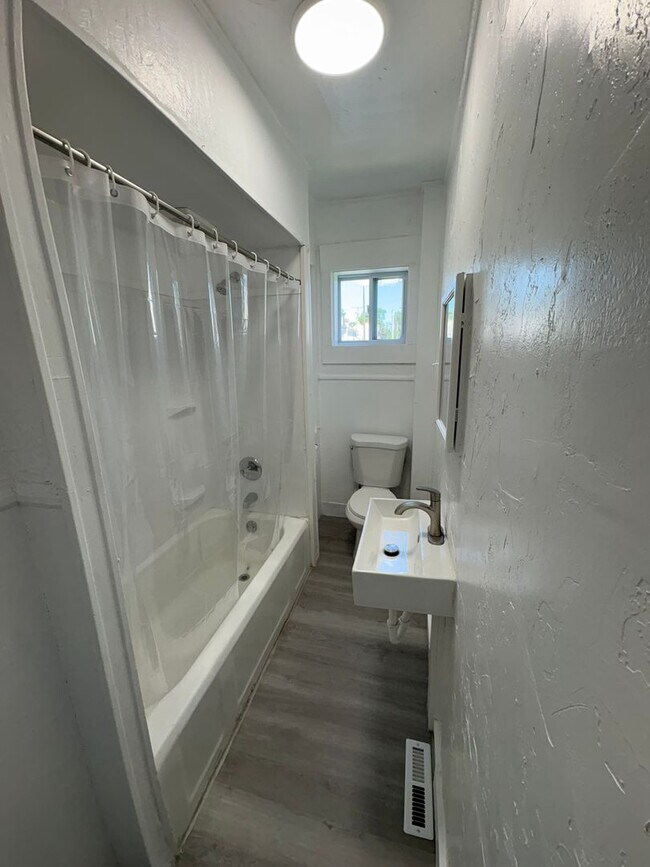 Building Photo - Newly Renovated Three-Bedroom, One Bathroom Row Home - Special Available – Contact Our Office for...