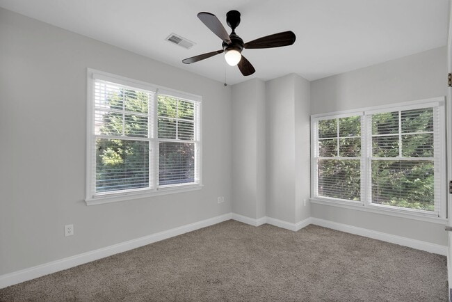 Building Photo - Wonderful craftsman style end-unit townhome