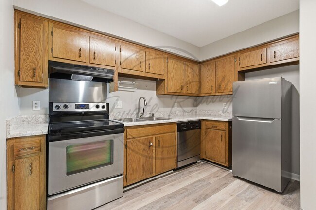 Building Photo - SPRING SPECIAL!! FIRST MONTH FREE on this Two Bedroom Condo, Garden Level with Washer/Dryer Hook ...