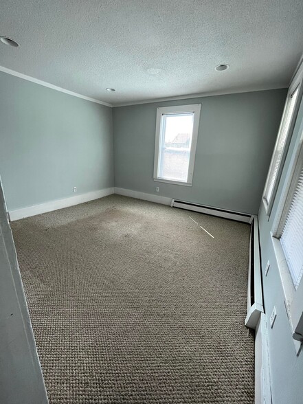 Living Room (new carpet not pictured) - 218 Charter Oak St