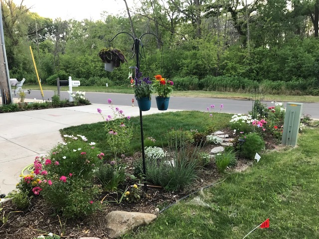 Driveway flowers and landscaping. - 2225 Middleton Beach Rd