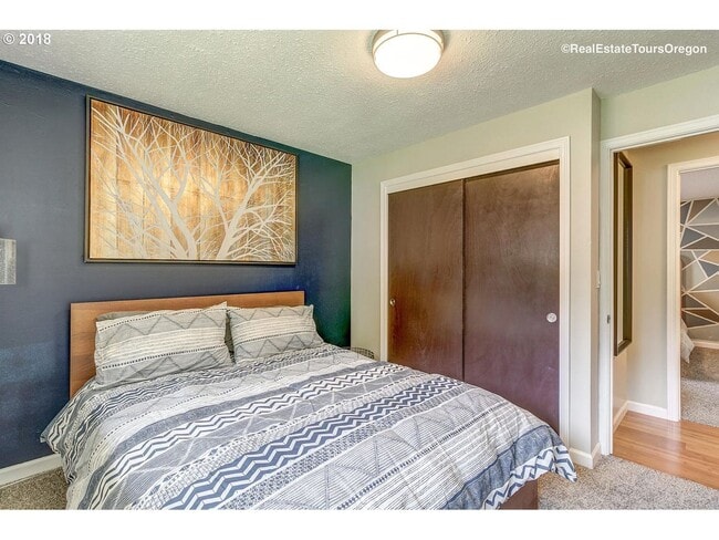 Building Photo - Spacious 4-Bedroom Home with Multiple Livi...
