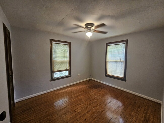 Building Photo - "Charming 2-Bedroom Home with Gleaming Hardwood Floors Ready for Move In!