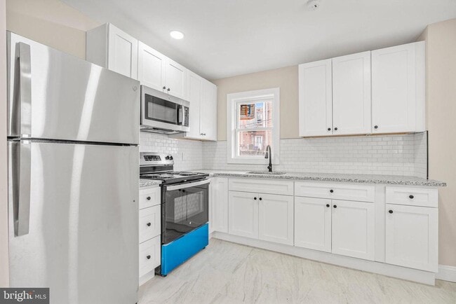 Building Photo - 7010 Cedar Park Ave