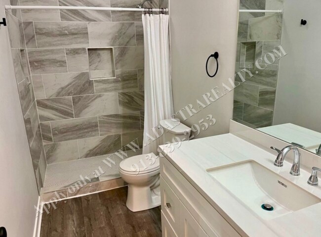 Building Photo - Spacious 4-Bedroom Townhome with Finished Basement in Blue Valley School District-Available NOW!!