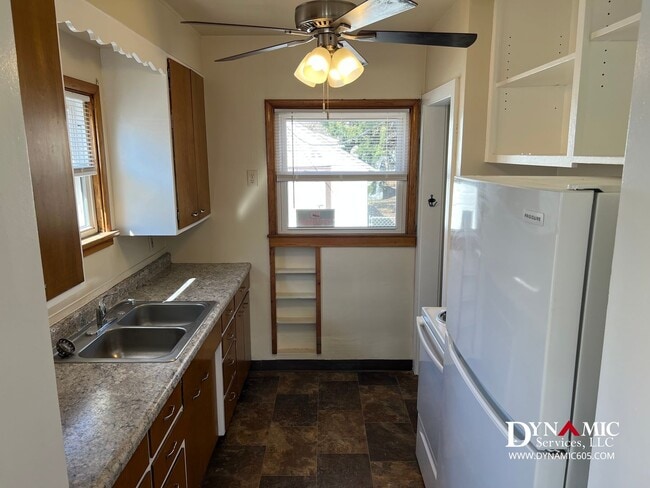 Building Photo - Updated 4+ Bedroom, 2 Bathroom House with Garage and Fenced Backyard