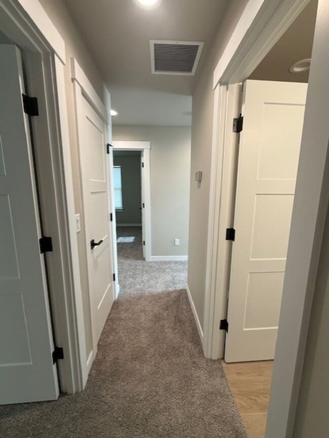 Building Photo - Beautiful brand new home in downtown Rosly...