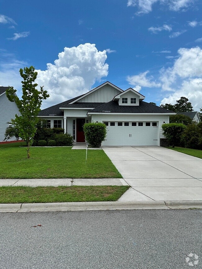 Building Photo - "Spacious 4-Bed Oasis with Stunning Lake V...