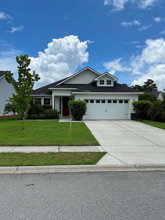 Building Photo - "Spacious 4-Bed Oasis with Stunning Lake V...