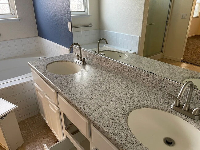 Building Photo - Freshly painted home with newer appliances. Quiet neighborhood near parks, shopping and schools.