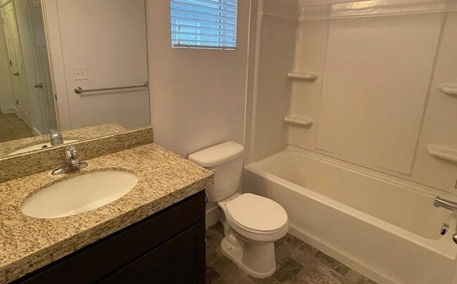 Building Photo - Spacious 4-Bedroom Home with Finished Basement in Taylorsville