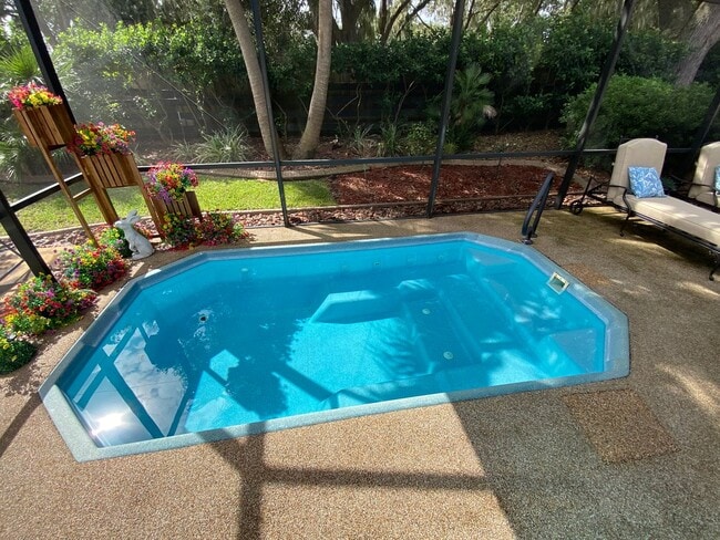 Building Photo - Gorgeous 3 + 2 Turnkey ANNUAL Lease w/Swim Spa & Large Private Screened in Patio In The Village o...