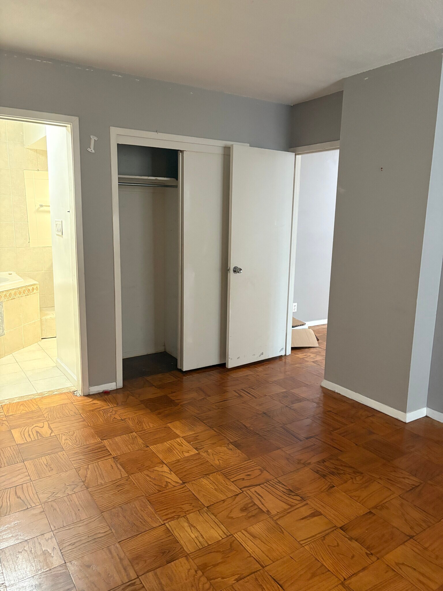 Master bedroom with view of other closet and masterbathroom - 4515 Willard Ave