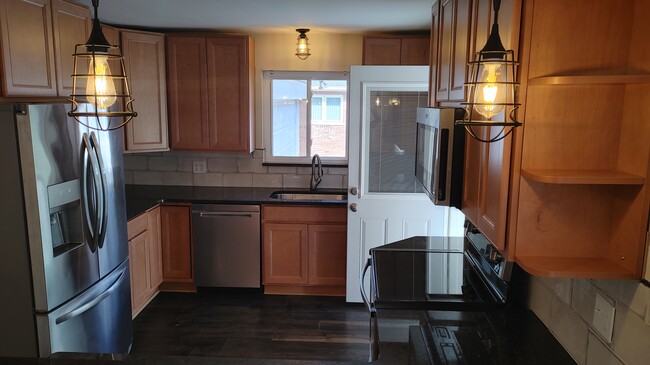 Kitchen view from breakfast bar area - 6934 Winding Way