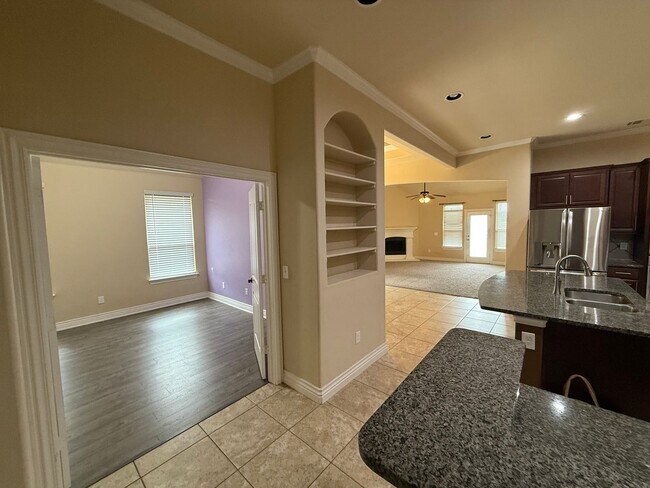 Building Photo - 3 bedroom + office  or 4th bedroom, storm shelter, neighborhood pond and walking track!