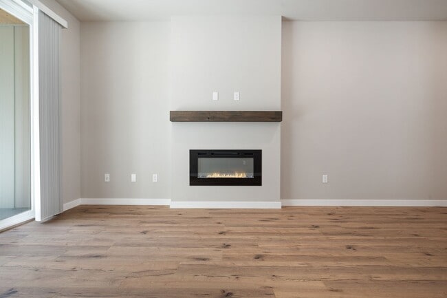 Building Photo - NEW CONSTRUCTION – Stylish 4-Bedroom Townh...