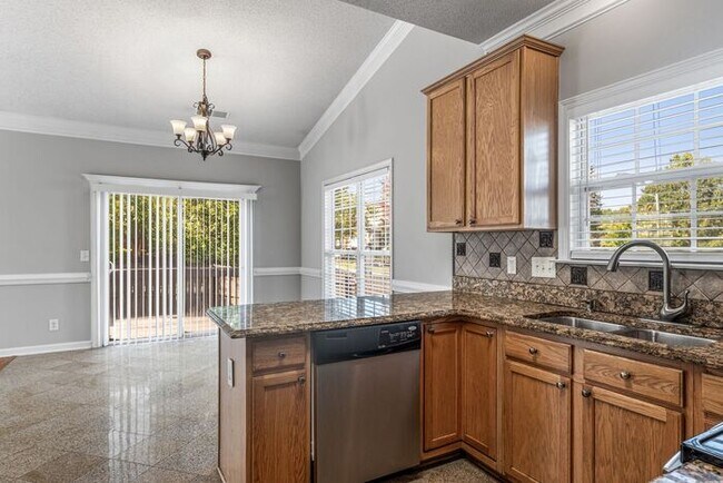 Building Photo - W. Wendover, Beautiful Home, Granite Counter-Tops, SS Appliances, Hardwoods, FP, Deck, Fenced, Ga...