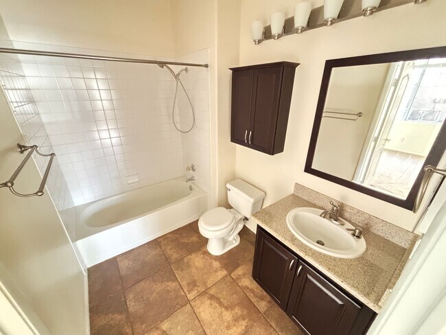 Building Photo - Charming 2Bed/Bath Condo located in a beautiful gated community in the Southwest.