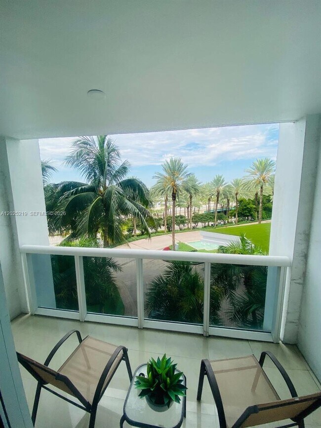 Building Photo - 10275 Collins Ave