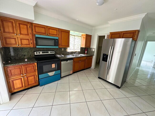 Building Photo - A charming home features 3 spacious bedroo...