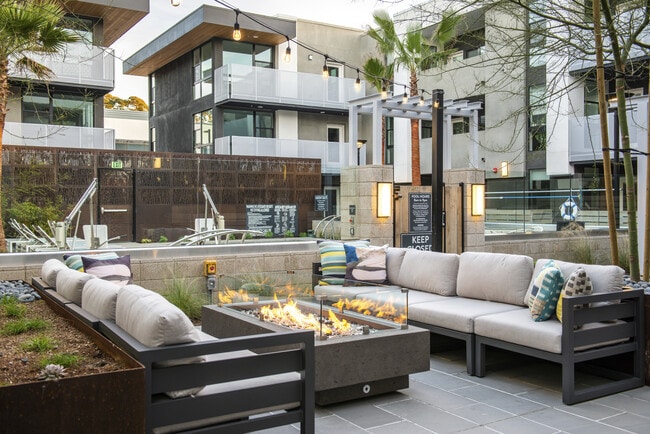 Fire Pit Lounge Area - The Californian Coastal Apartments