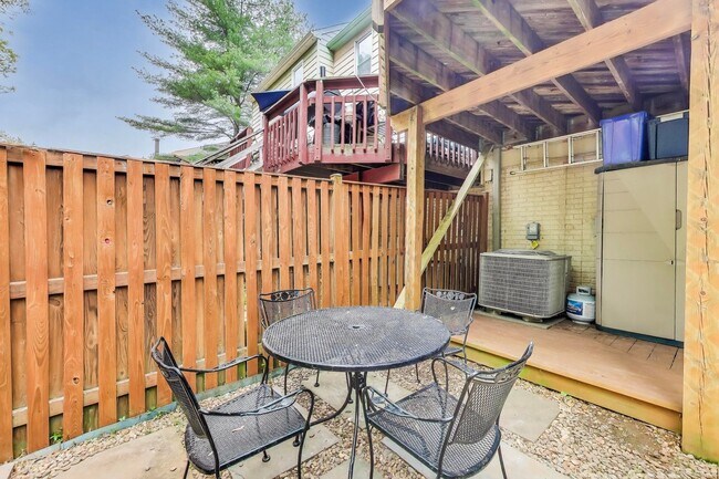 Building Photo - COMINGS SOON - Beautifully Updated Winchester-Built Townhome Backing to Serene Parkland.