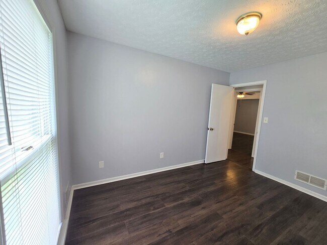 Building Photo - Brick Ranch in the heart of Jeffersontown! Featuring hardwood styled floors, 3 Bedrooms, 1.5 Bath...