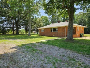 Building Photo - Charming Brick Rancher on Massive Lot – Move-In Ready!