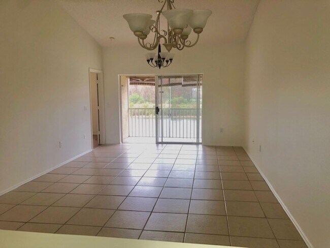 Building Photo - Nice 2X2 located on 2nd floor- Tile & laminate flooring! NO CARPET! Call today!! Tranquil water v...