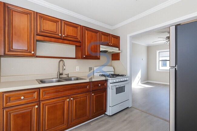 Building Photo - Move in before December 15th and choose your reward: a $250 Amazon Gift Card or a 55" Smart TV!