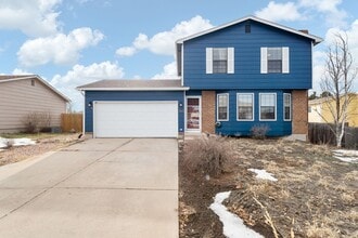 Building Photo - Tri-Level 4 Bed Home Near Ft. Carson