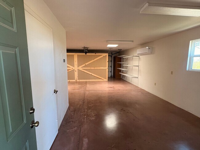 Building Photo - Desert Home on 3.3 Acres with Rooftop Views & Unique Rammed Earth Design