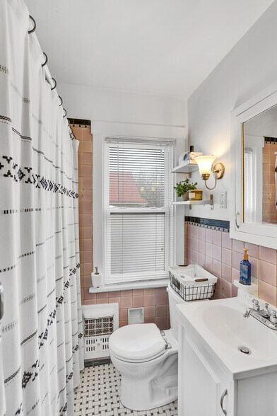 Bathroom with curtain rod provided - 203 Richbarn