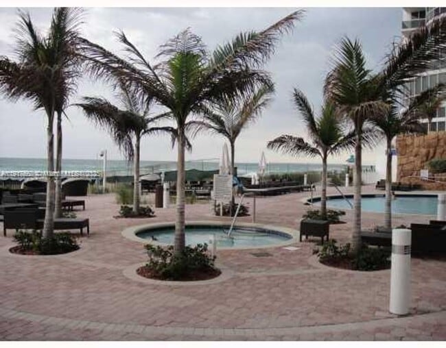 Building Photo - 18201 Collins Ave