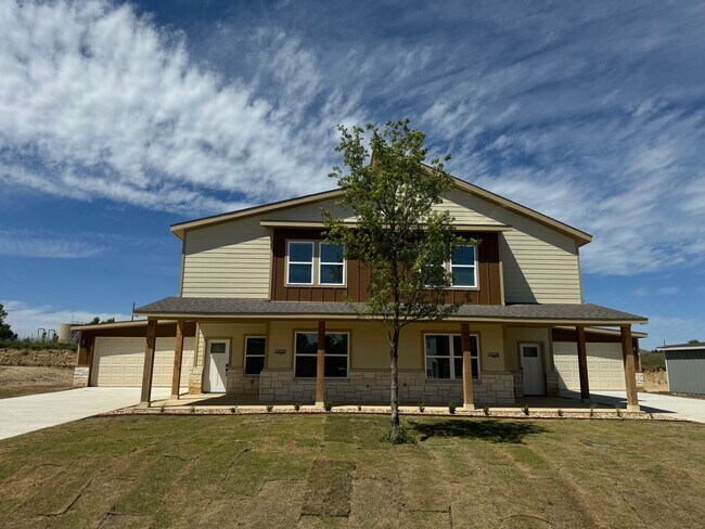 Building Photo - COMING SOON.....Modern Townhome with private fenced yard! HIGH CEILINGS PETS WELCOME