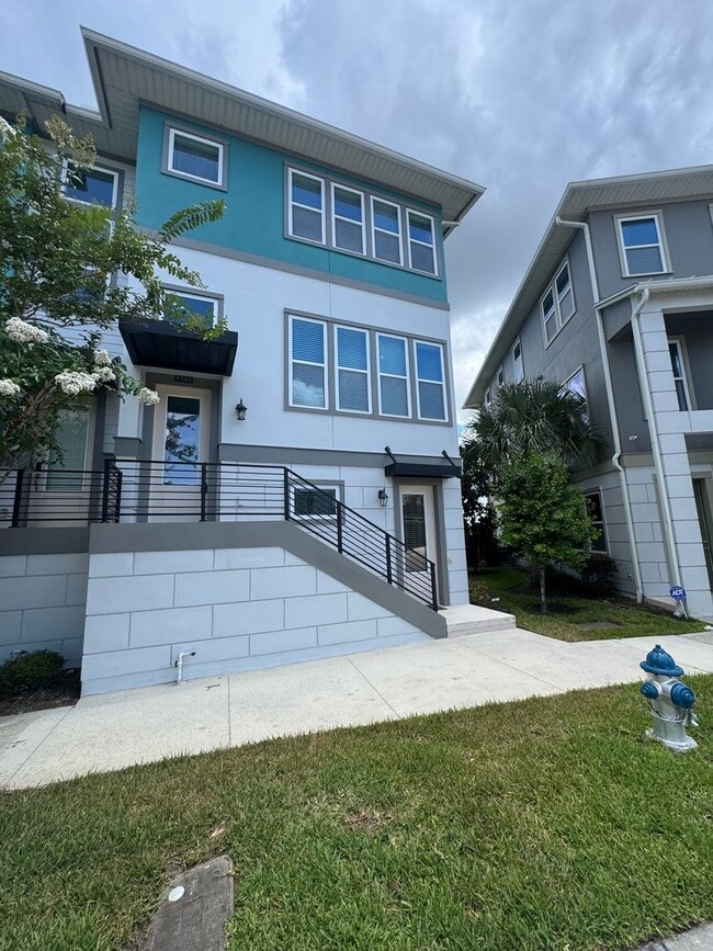 Building Photo - Lake Nona Move-In Special! Save $100/Month | 4 Bed, 3.5 Bath Laureate Park Townhome