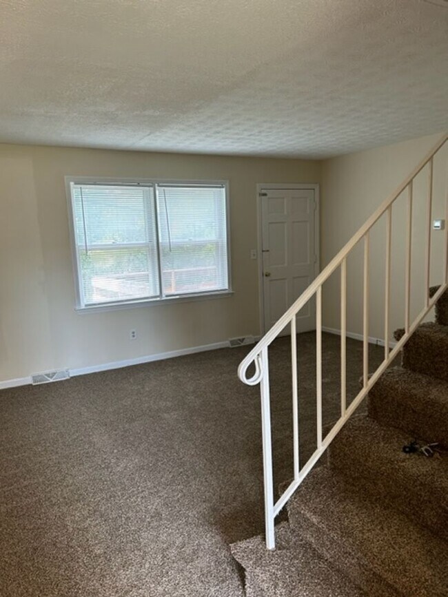 Building Photo - East Hills Townhome.    07072026