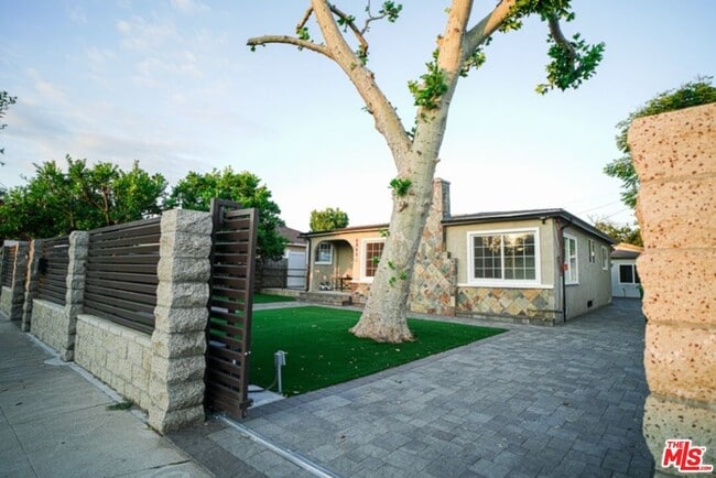 Building Photo - 6840 Nestle Ave