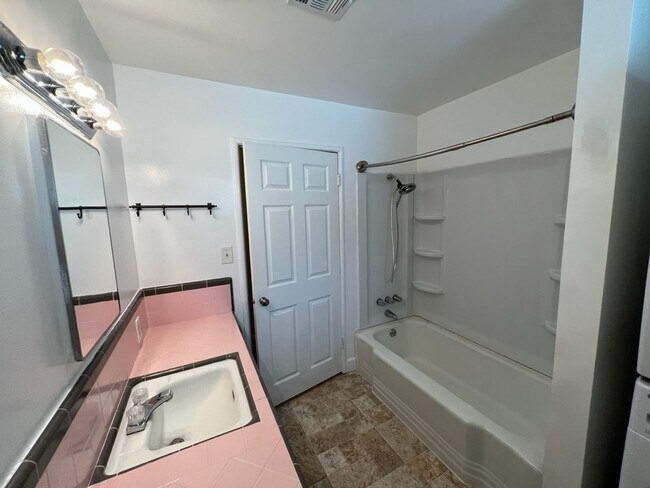 Building Photo - Two-bedroom single story unit with a carport!