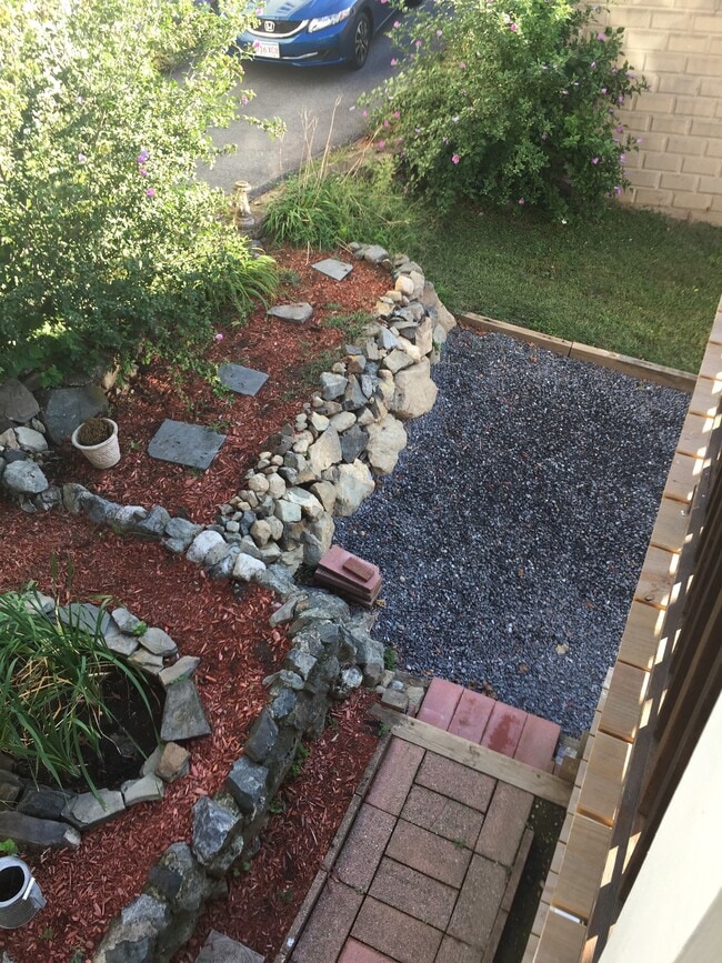 Leads to driveway - 97 Bow St
