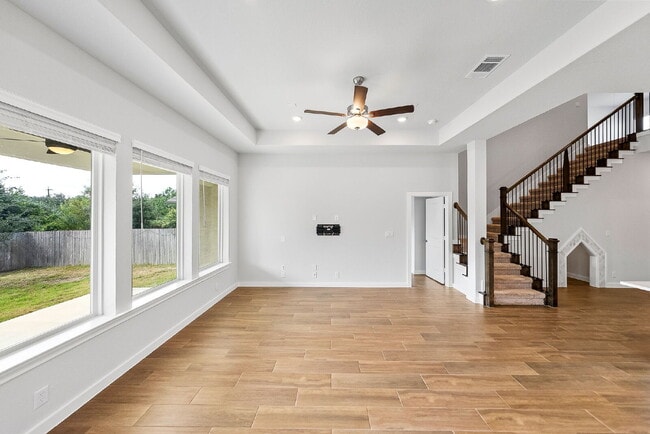 Building Photo - Greenbelt. 3 Car Garage. Built In Dog Room.